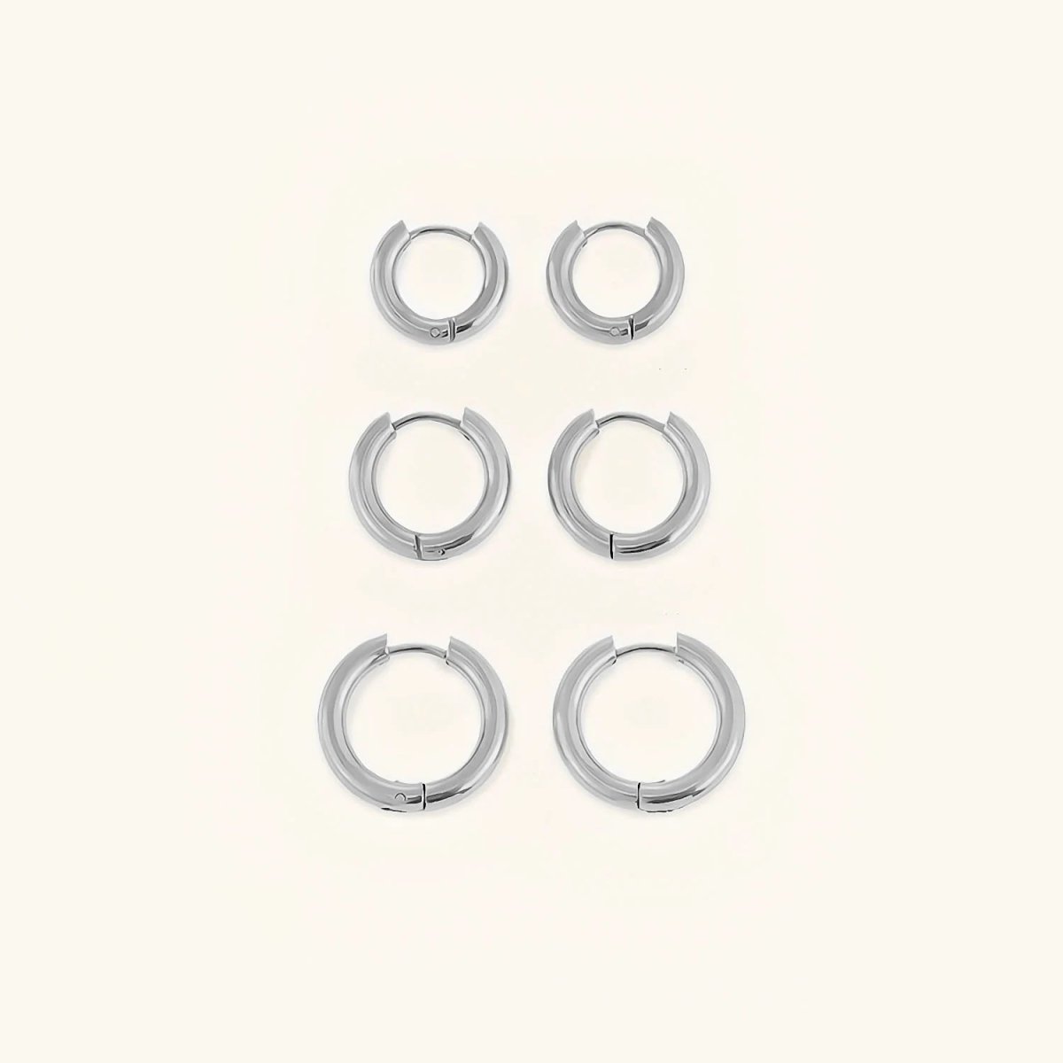 Pendientes de aro triples dorados