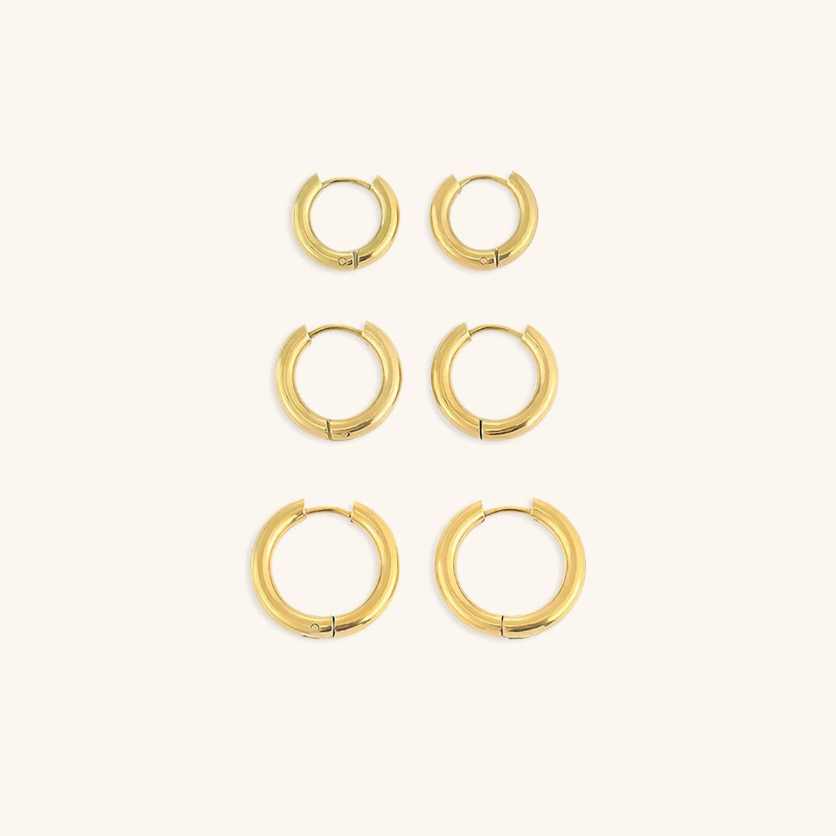 Pendientes de aro triples dorados